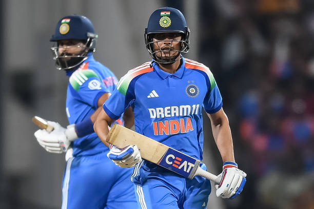 Shubman Gill and Shreyas Iyer run between the wickets during the first ODI between India and England in Nagpur on February 6, 2025. (Photo by Noah Seelam/AFP via Getty Images)