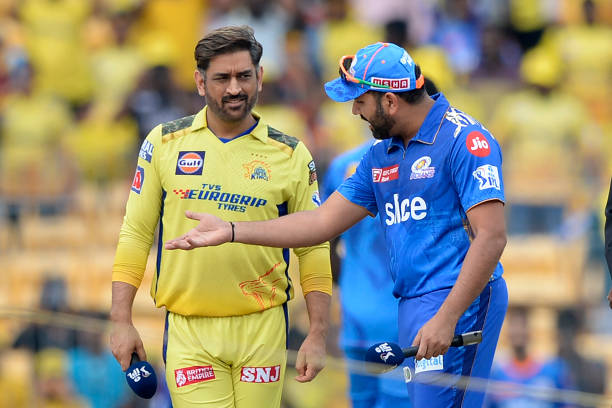 Rohit Sharma gestures to MS Dhoni during the toss before the IPL match in Chennai on May 6, 2023. (Photo by R. Satish Babu/AFP via Getty Images)