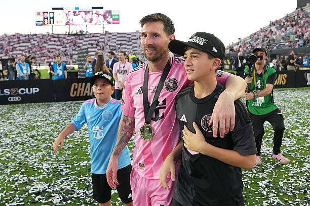 Lionel Messi #10 of Inter Miami CF celebrates with his sons Thiago Messi and Mateo Messi after winning the Championship following the Audi 2025 MLS Cup Final