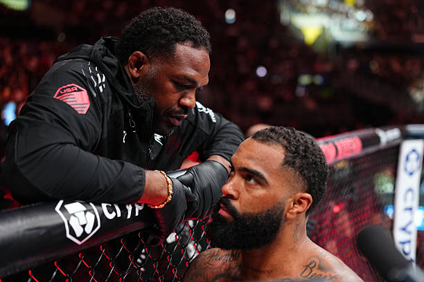 Jon Jones provides instruction to Gable Steveson