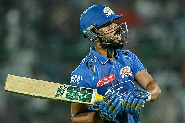 Mumbai Indians' Naman Dhir reacts